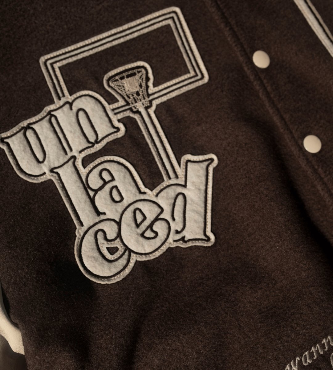 UNLACED VARSITY JACKET